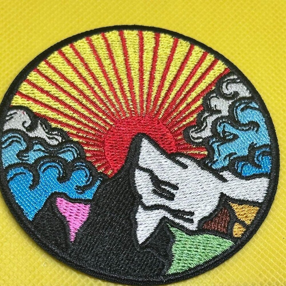 Multi-coloured mountain sunrise embroidered patch